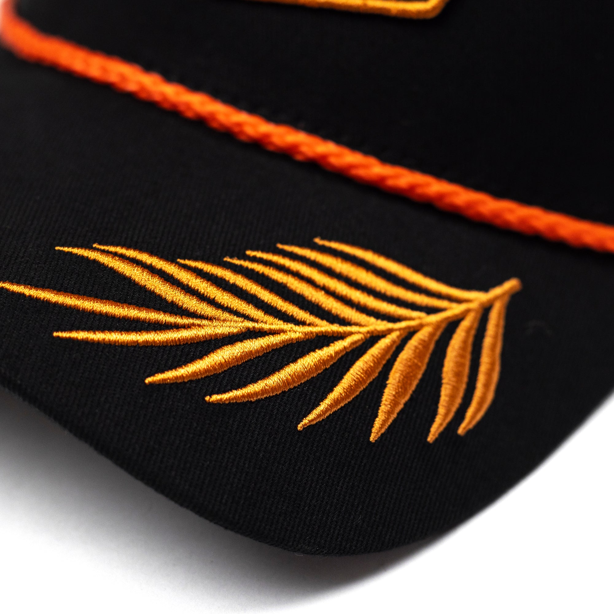ICON Podium Trucker Cap - Black/Rust