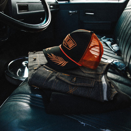 ICON Podium Trucker Cap - Black/Rust